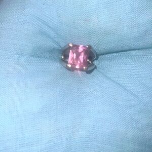 This is a pink silver ring size 8.